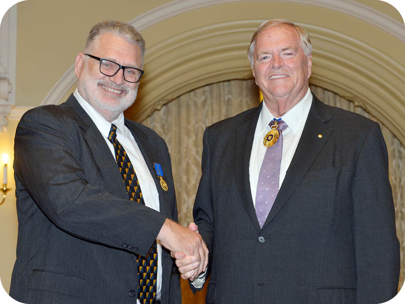 Phil Bianchi receiving his OAM from Kim Beazley, Govenor of Western Australia in April 2019